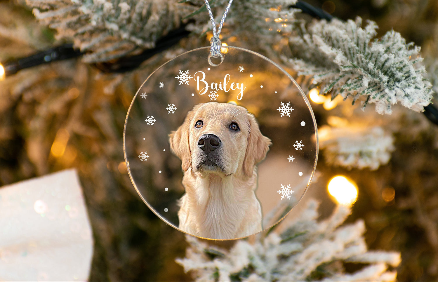 Dog ornament with 'Bailey' on a Christmas tree