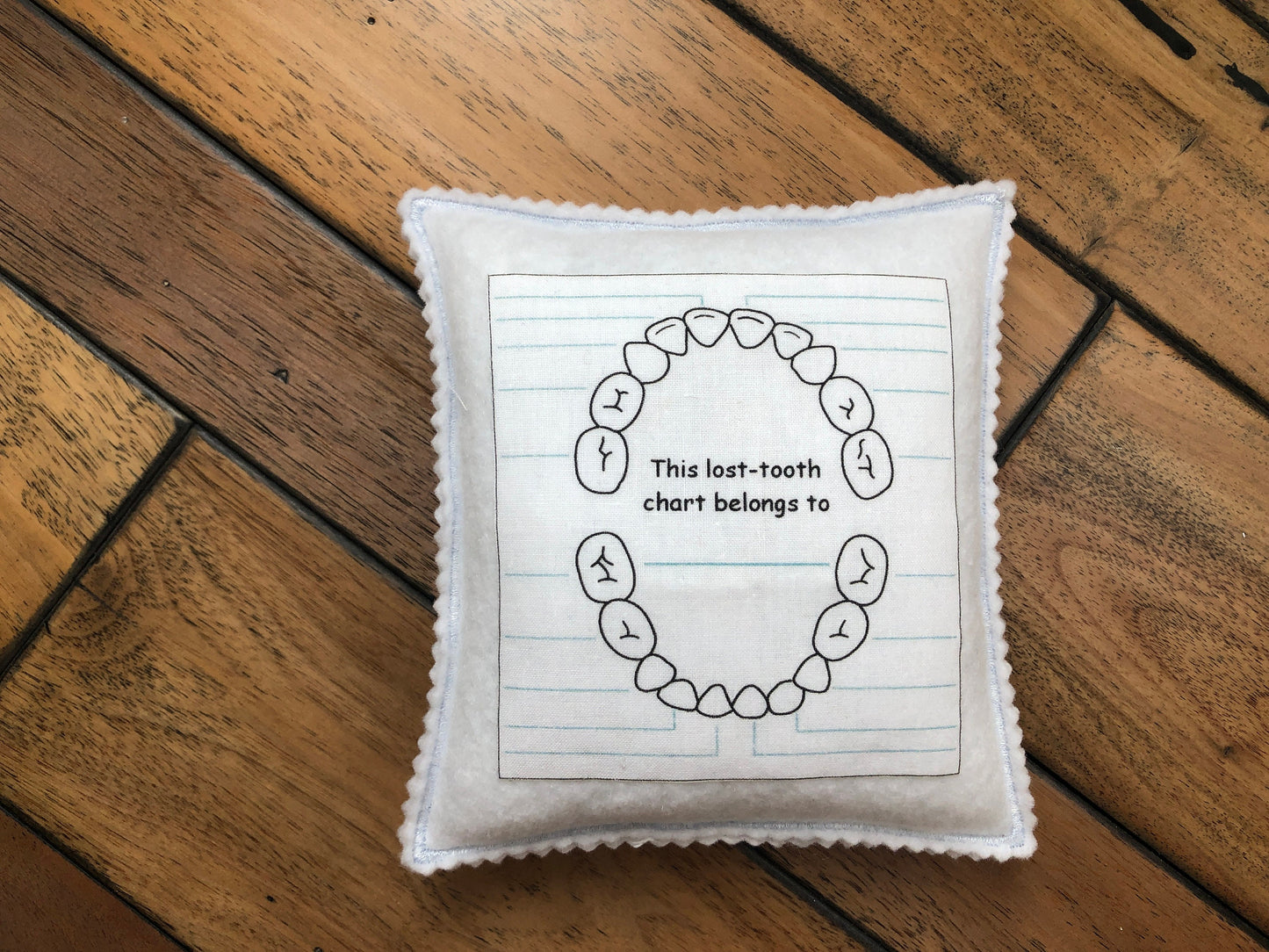 Tooth fairy pillow with tooth chart