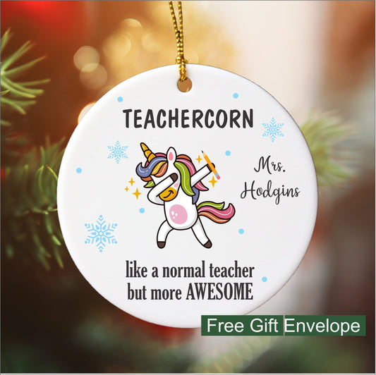 Round teacher ornament featuring a colorful, dabbing unicorn with the message 'Teachercorn, just a regular teacher but more awesome.' Personalizable with the teacher's name, this playful design is perfect for celebrating the extraordinary educator