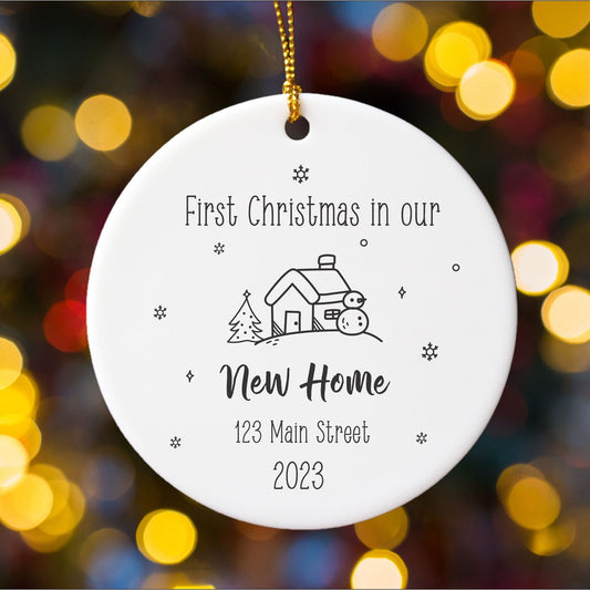 Ceramic ornament featuring the address and moving-in date of a new home. This personalized keepsake is perfect for celebrating a housewarming or commemorating a family's new beginning. Timeless design, ideal for holiday decor or year-round display